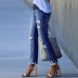 jeans slim con borlas rasgadas NSWL123955