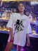 Camiseta holgada de manga corta con estampado de caracteres chinos NSSN127012