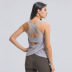 conjunto de yoga de dos piezas con blusa y sujetador de yoga con tirantes cruzados elásticos de color sólido NSDQF127370