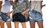 shorts de mezclilla slim con agujeros y bordes enrollados NSXXL128266