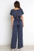 round neck short-sleeved wide-leg lace-up polka dot print jumpsuit NSFH128318