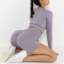 conjunto de yoga de pantalones cortos de levantamiento de cadera de cintura alta ajustados de punto sin costuras de color sólido NSNS125425
