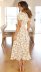 short-sleeved floral printed V-neck large swing dress NSHFC125582