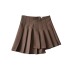 falda plisada con dobladillo irregular estilo universitario en color liso NSXDX132721