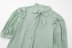 camisa holgada de color liso con manga abullonada y lazo NSAM134631