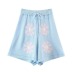 pantalones cortos de punto con cintura elástica y cordón con estampado de flores grandes NSXDX135759