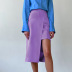 falda de cintura alta de longitud media con dobladillo irregular y abertura en color liso NSSQS135814