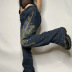 jeans rectos holgados de talle alto con mariposa bordada retro NSGXF135839