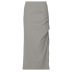 Falda plisada de cintura alta con abertura en color liso y falda fina de longitud media. NSTNV135954