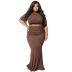 plus size slim short sleeve high waist round neck solid color top and skirt two-piece set NSLNW136926