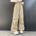 Pantalones cargo tejidos con cordón y costuras asimétricas en los bolsillos de color liso NSSSN136222